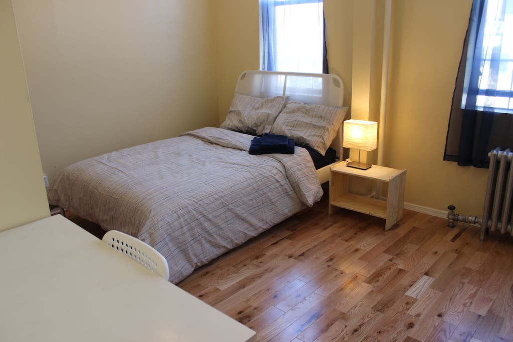 Big, sunny room for your stay, including desk for working.