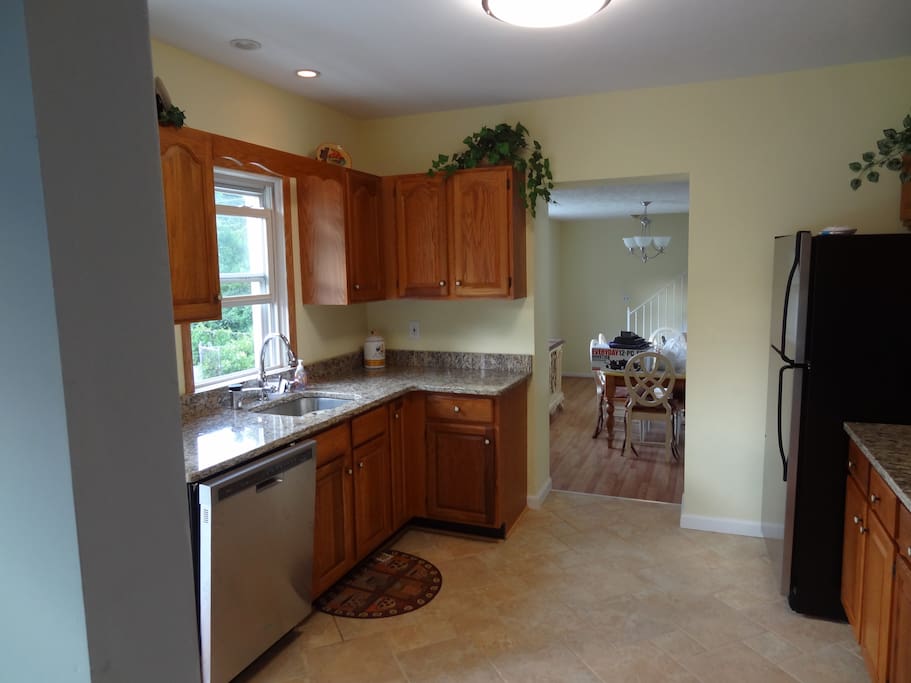 Cozy kitchen facing kitchen table and family room