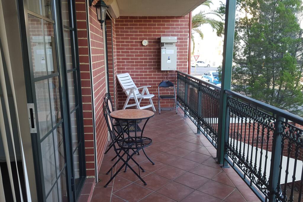 Relax on this huge balcony