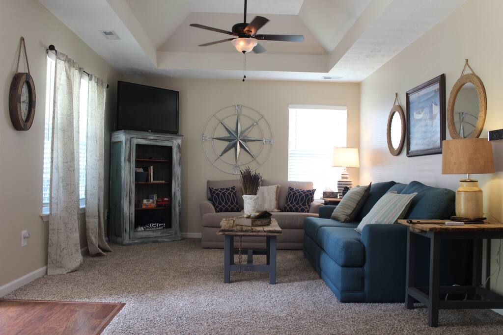 The living room has a couch that pulls out into a queen size bed - memory foam.