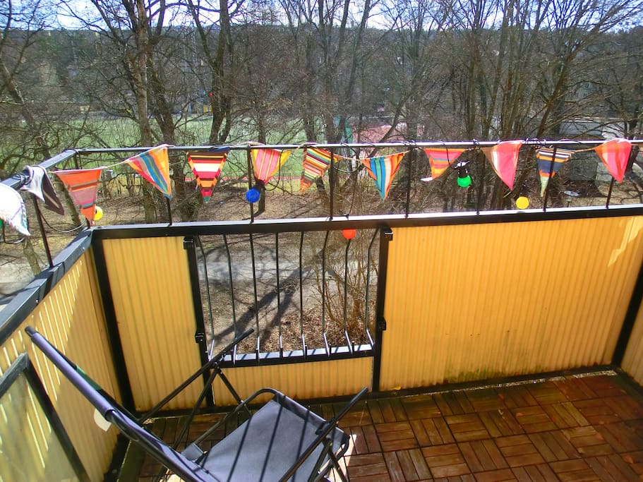 Balcony with view of the park, sunny all day