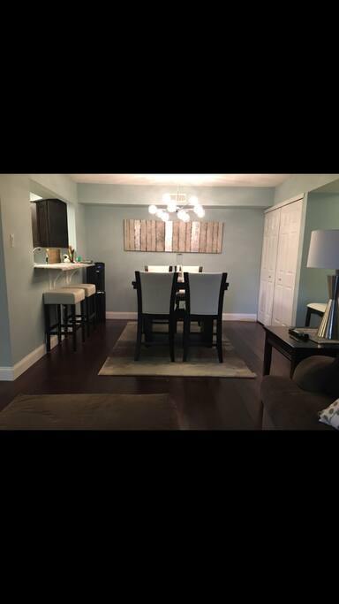 Attached dining area- table expands and seats up to 6 people. Two additional seats are also available at bar.