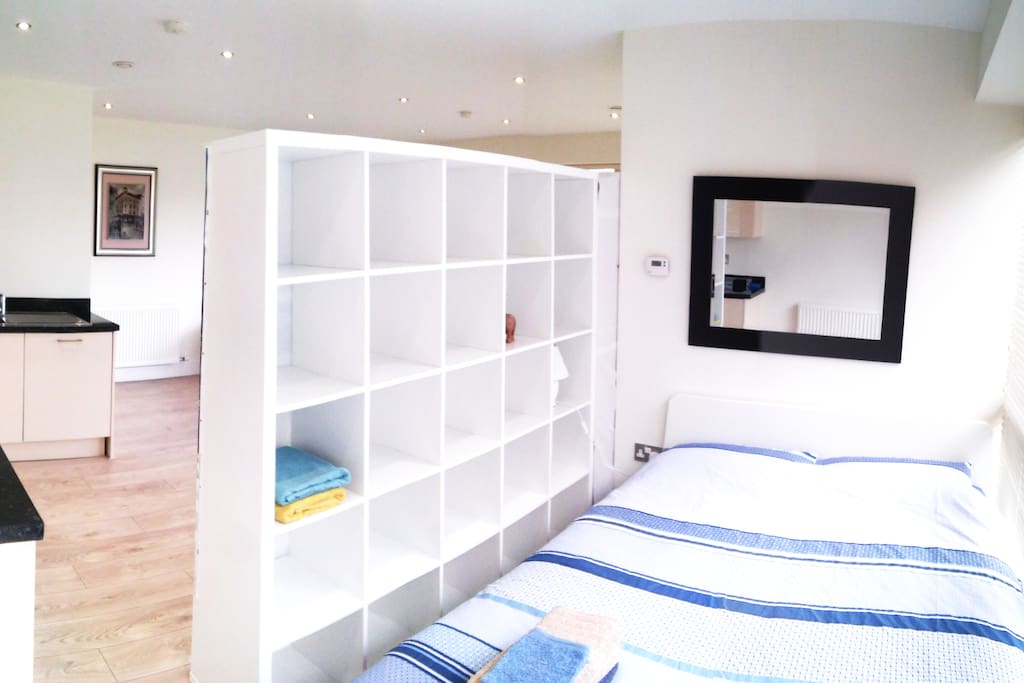 Your bedroom with a large king size bed for 2 people and a big shelve for your clothes