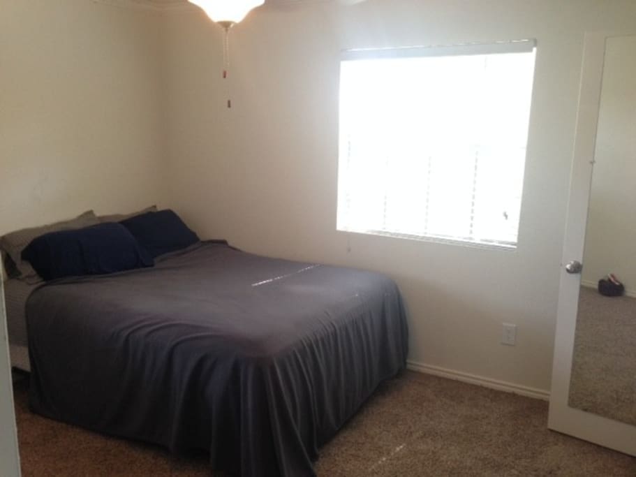 Two bedrooms on opposite ends of the unit, both look as seen here.