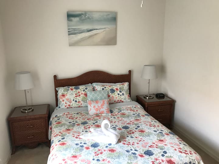 Queen size bed and ground floor