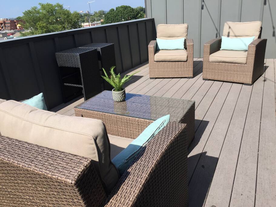 Enjoy morning coffee on the rooftop deck or a relaxing beverage under the glowing lights