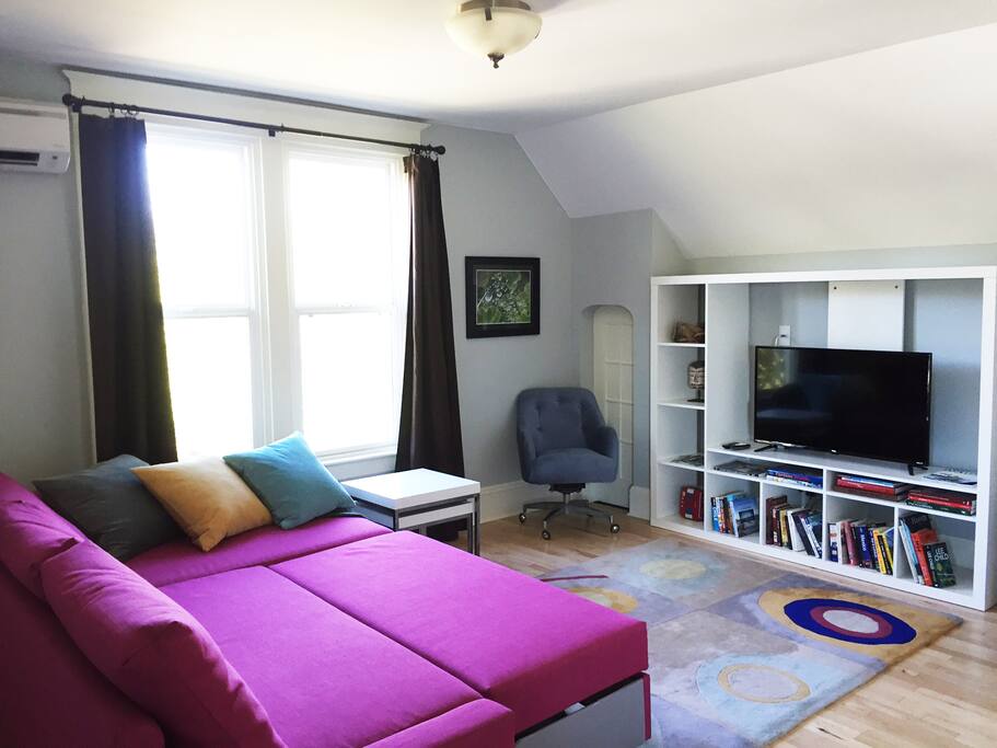 Curl up on the fold out couch and watch your favorite movies or shows on a Roku TV with access to Netflix, Amazon and more.