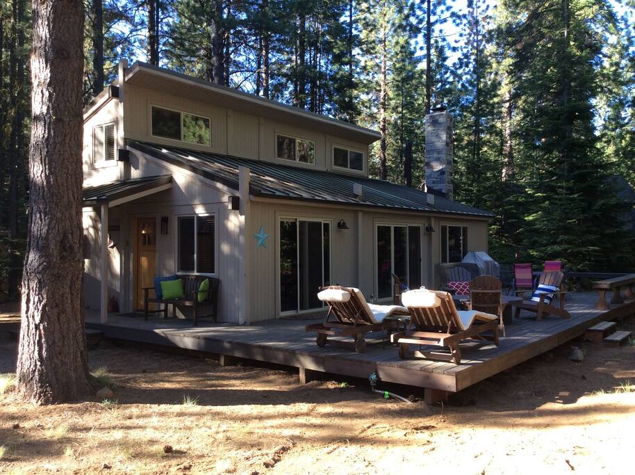 Large outdoor Deck with a fire table