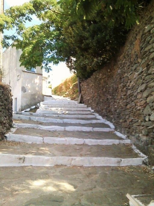 View of the path leading to Agios Artemios, the closest parking area.
