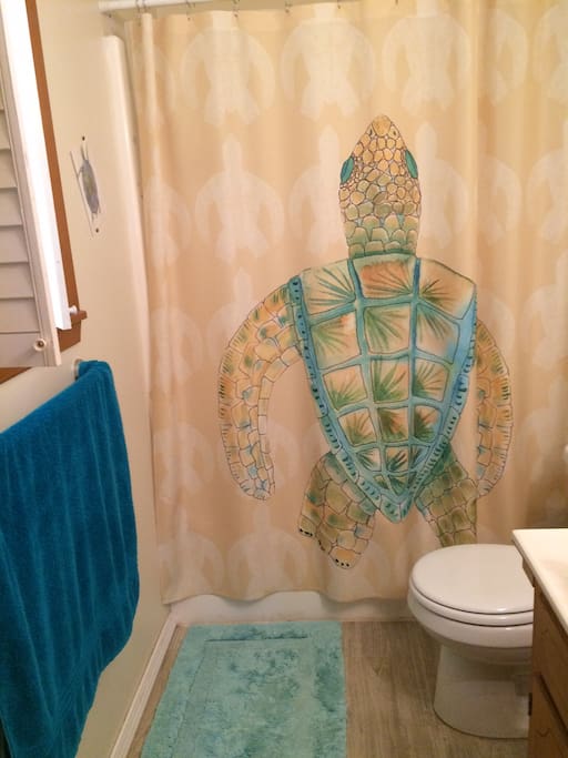 The bathroom has a tub/shower and is attached to the bedroom. Lots of privacy.