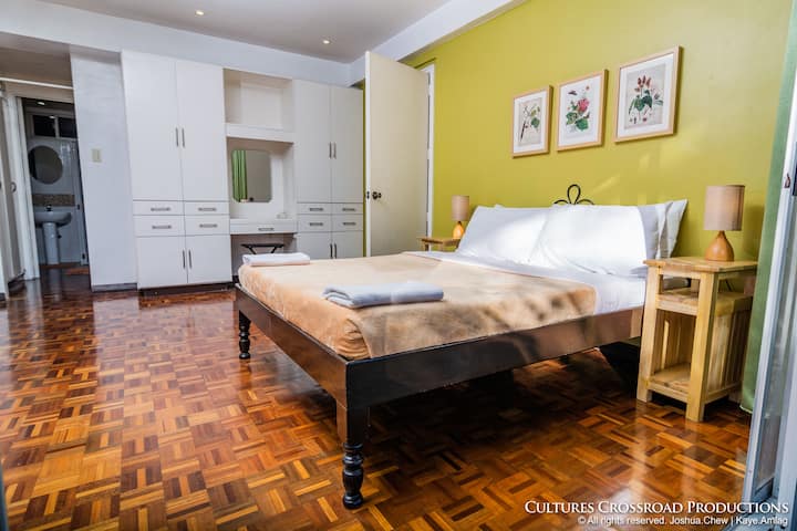 The Master Bedroom has a queen-size bed and plenty of storage space.