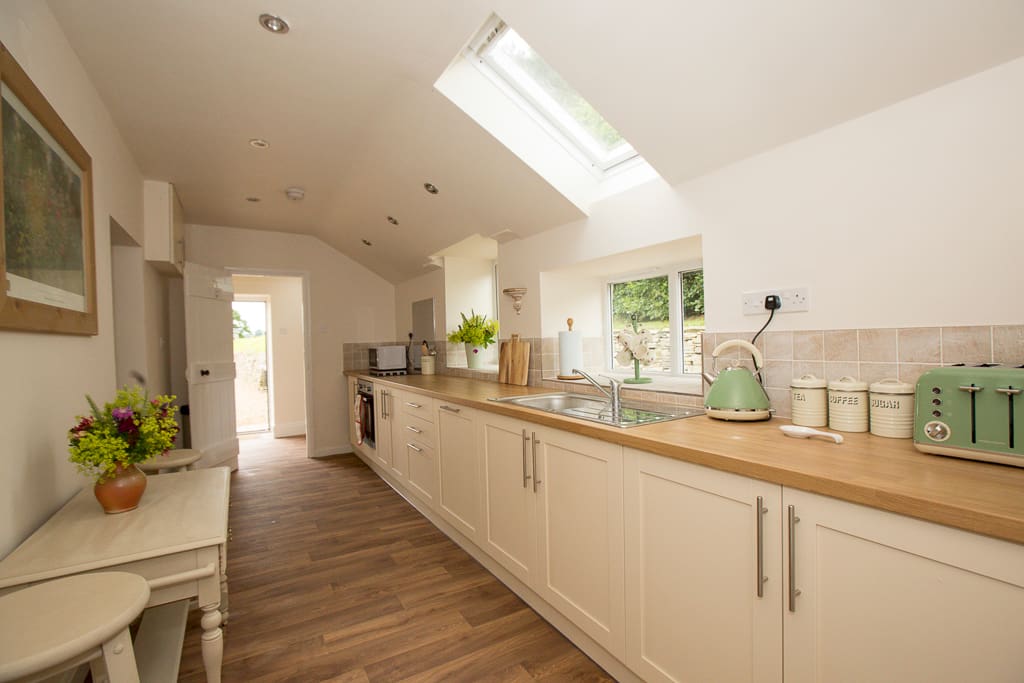 New, fully equipped kitchen with utility area