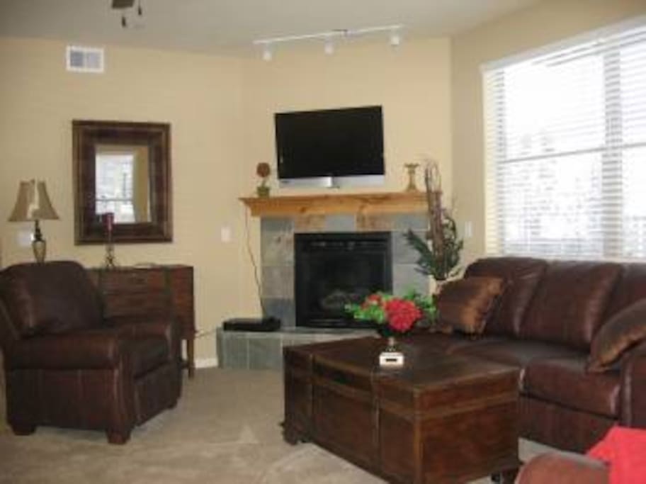 Spacious Family Room W Gas Fireplace and Flat Screen TV