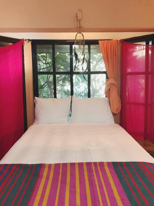 double bed in the bay window