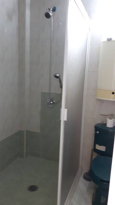 Hot shower, private bathroom space for your toiletries, well ventilated.