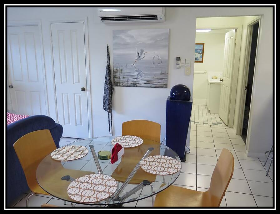 Dining area looking towards guest bedroom and bathroom.