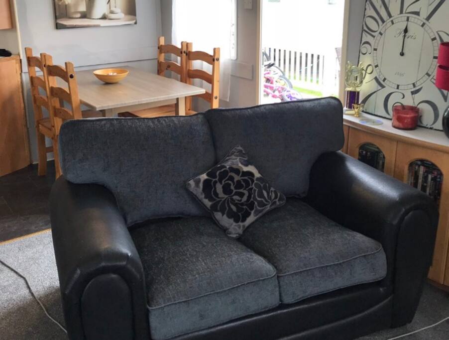 Living room area with dinning room