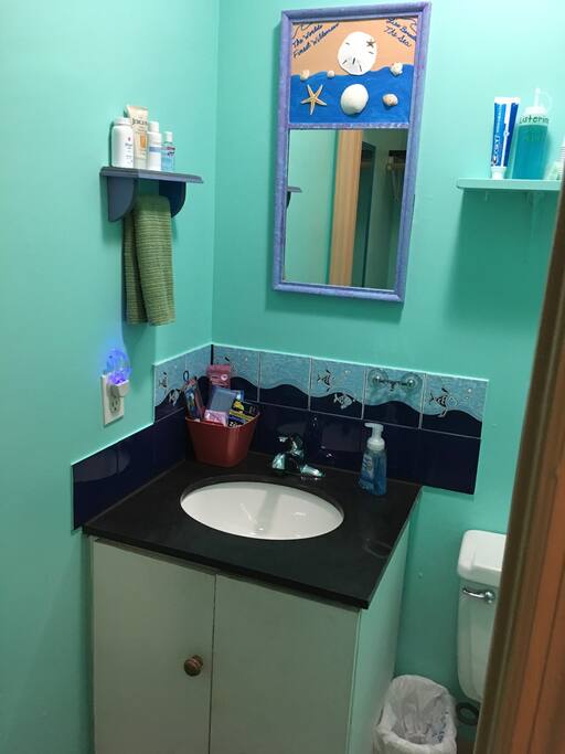 Vanity sink with tile backsplash. The mirror is one of my diy projects ;-)