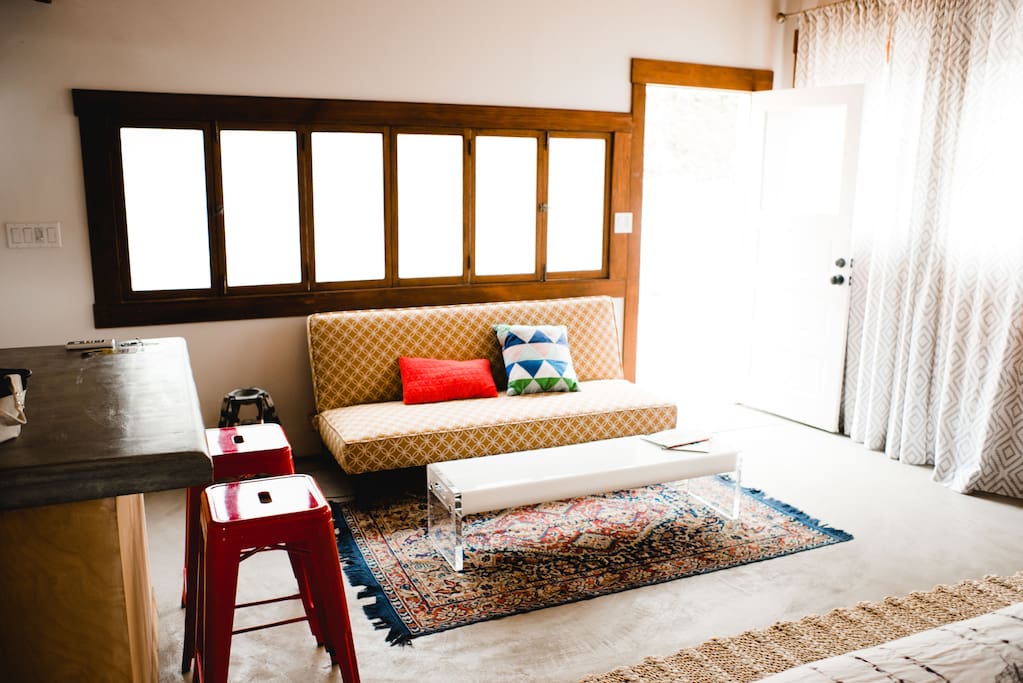Sunny and spacious. The couch folds into an extra bed.