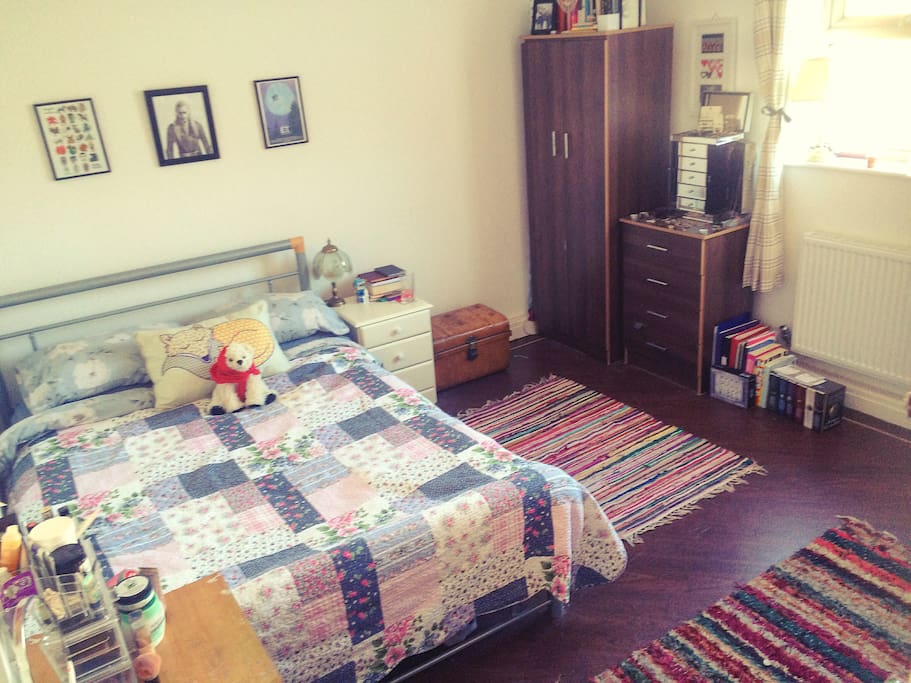 Large, spacious and bright bedroom with double bed, lots of light and room to spread around.