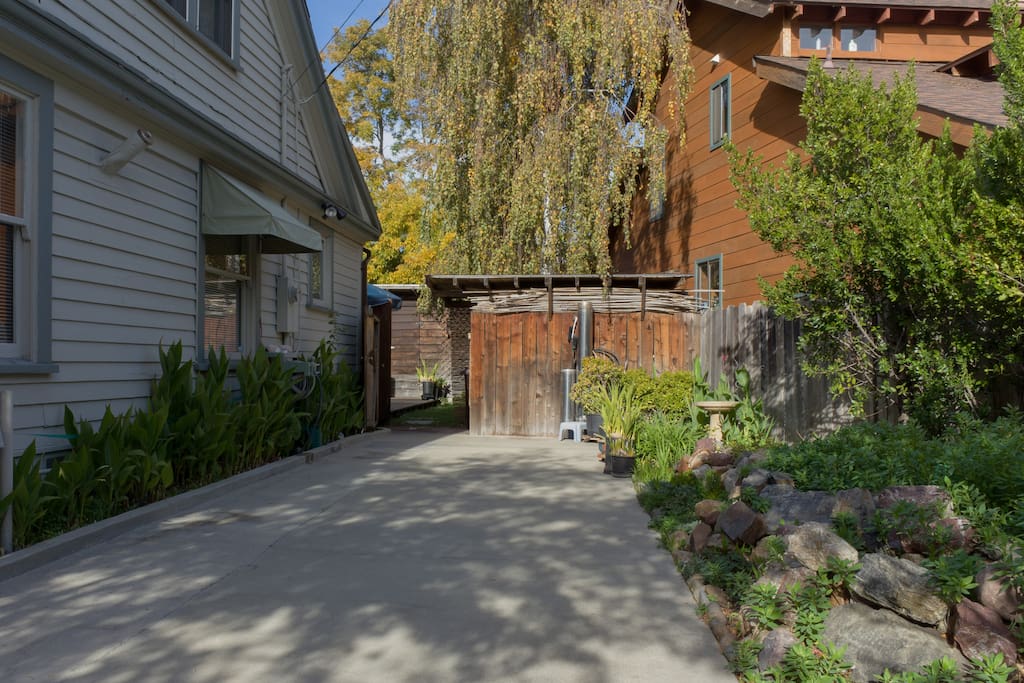 Park in private driveway and walk through gate to studio