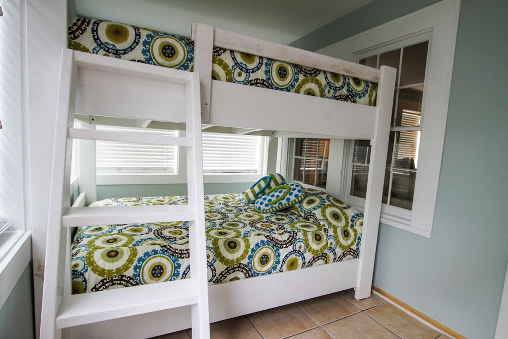 Bunk area right off entrance. Bunks are full size beds.