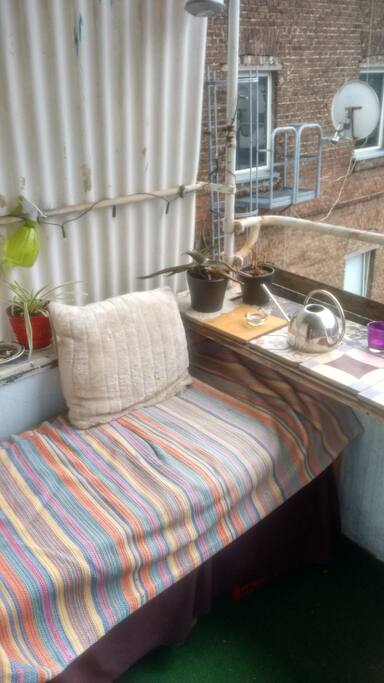 Comfortable bench on the balcony