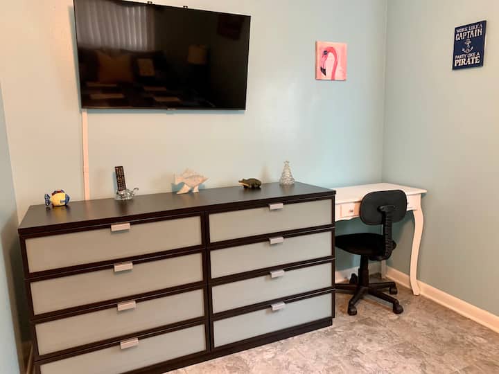 Dresser and workstation/vanity in master bedroom