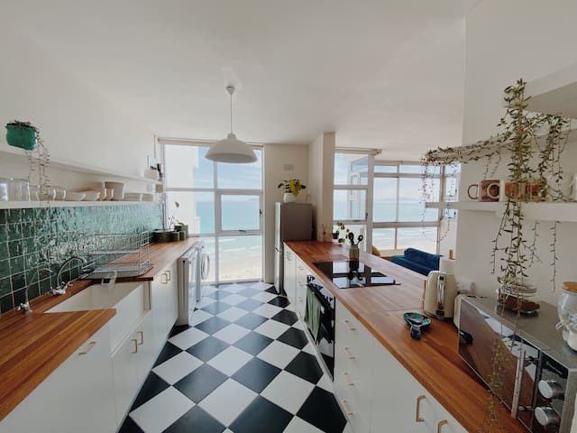 cute, sun-soaked apartment above the sea