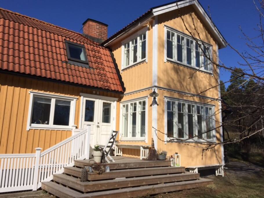 Back of the house with sun parlor