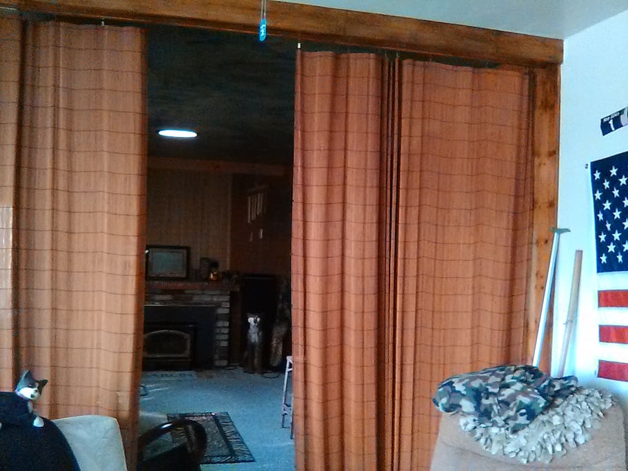 The curtain door to the Den room from kitchen.