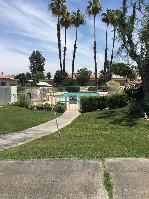 Picture of Pool & Spa from golf course the condo is just behind Pool in this picture