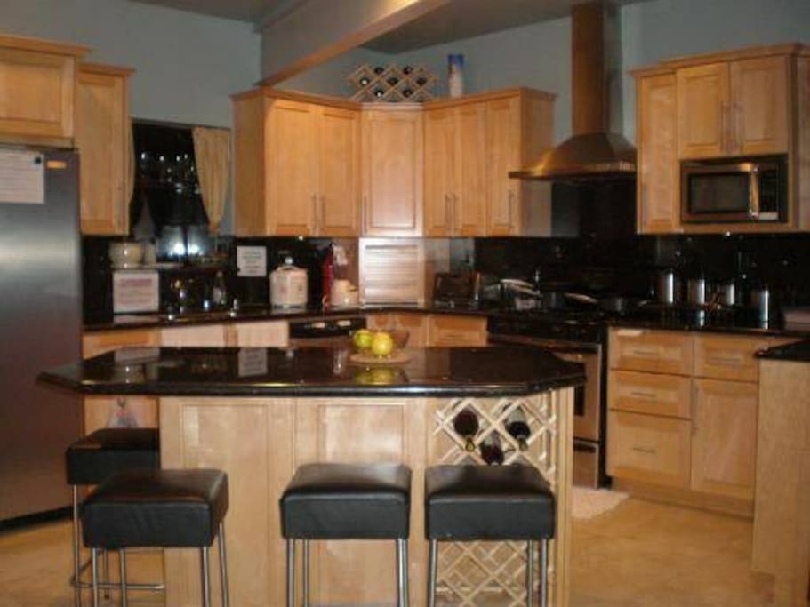 Kitchen with large island. Feel free to make your meals.