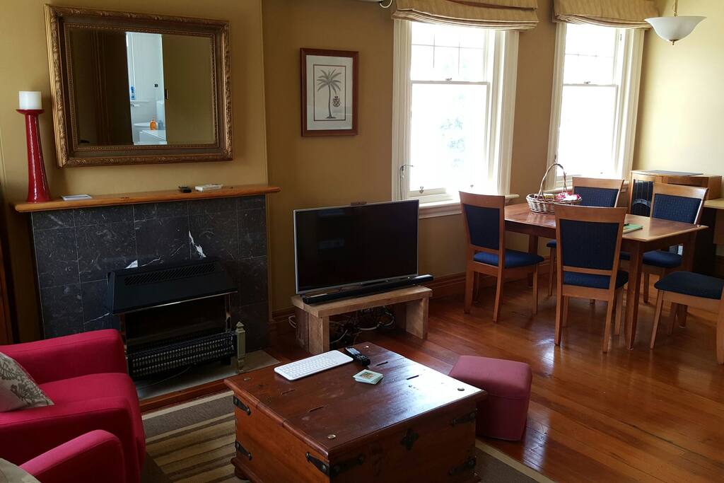 Open plan living room off kitchen & dining area. Smart TV (view 1).