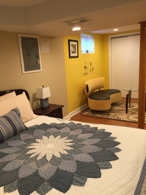 Full size of the bedroom with a comfy sofa and many more things