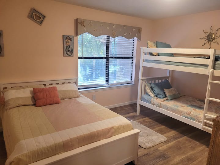 Secondary bedroom has a full bed; set of bunk beds; Closet; dresser; TV 
& bathroom en-suite