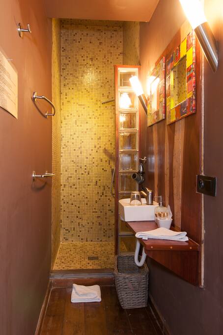 Bathroom with shower and sink
