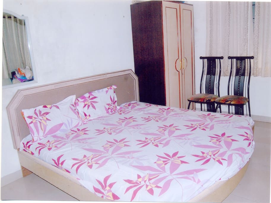 Bedroom with an attached bathroom
