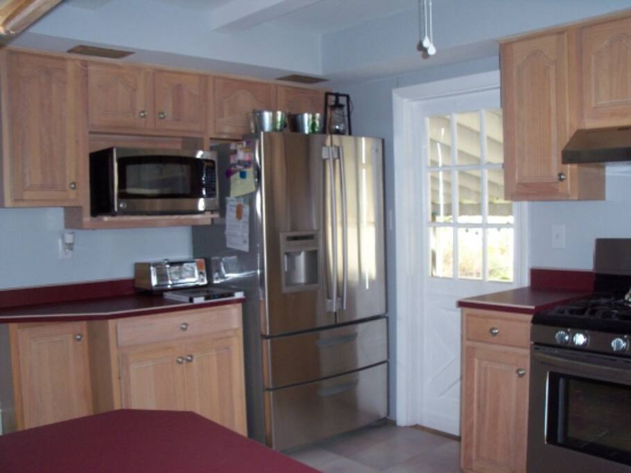 Fully stocked kitchen with gas stove