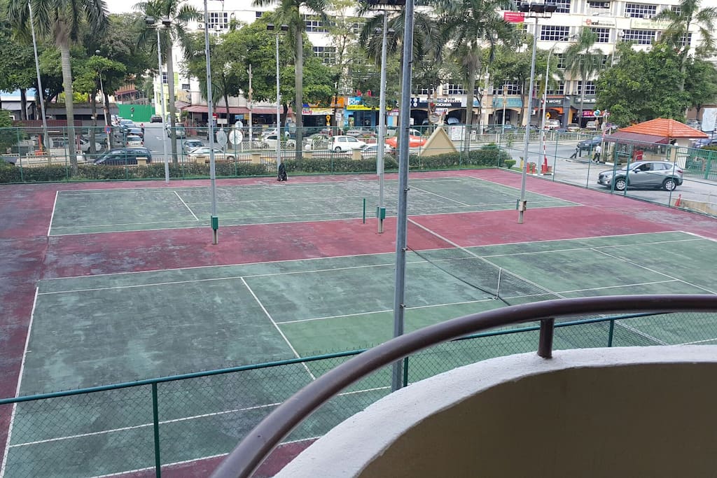 Balcony that faces 2 tennis courts