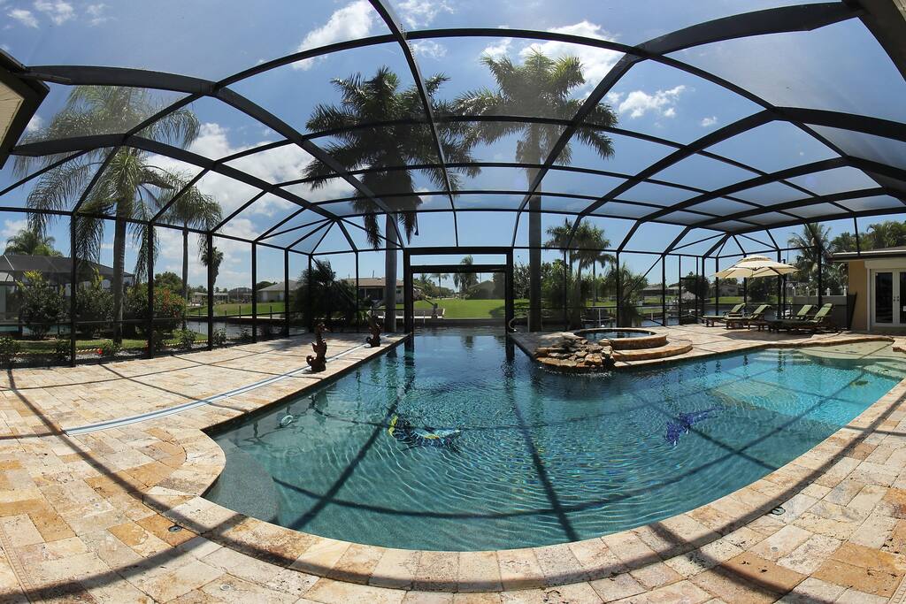 designer pool with infinity edge and plenty of room to relax on 600 sqm patio/pool area