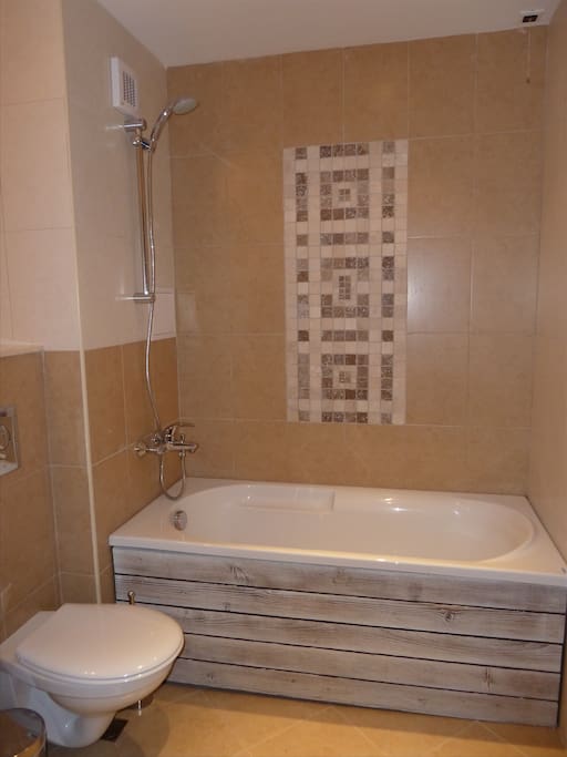 Bathroom 1 including bath and shower