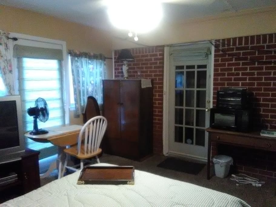 entrance to main house and atrium door facing patio