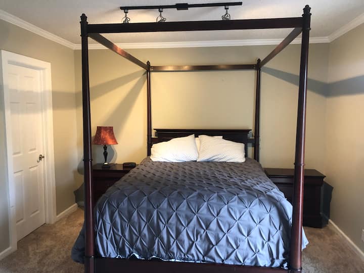 The master bedroom has a queen-size bed for a perfect night’s rest. 