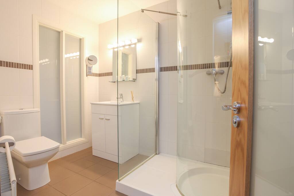 Master bedroom ensuite complete with curved shower