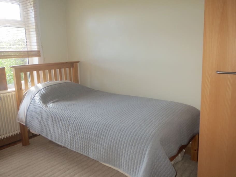 pic shows bed and wardrobe alongside