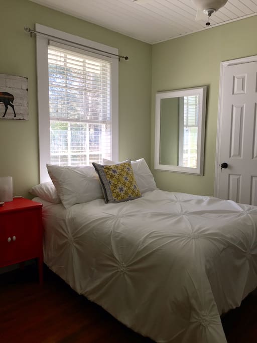 Your sunny room with comfy bed ...You'll hear the birds in the mornings :)