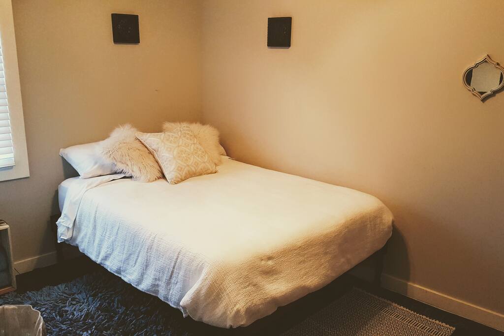Bohemian platform bed with organic cotton duvet