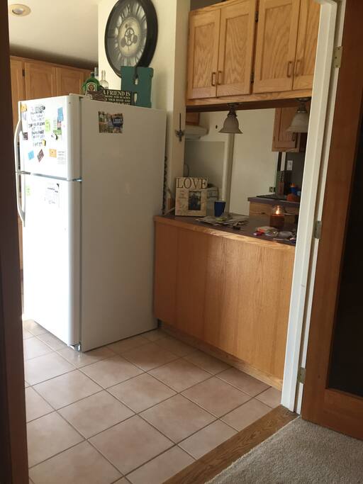 Kitchen, with dining room attached, leads to large walk out deck.