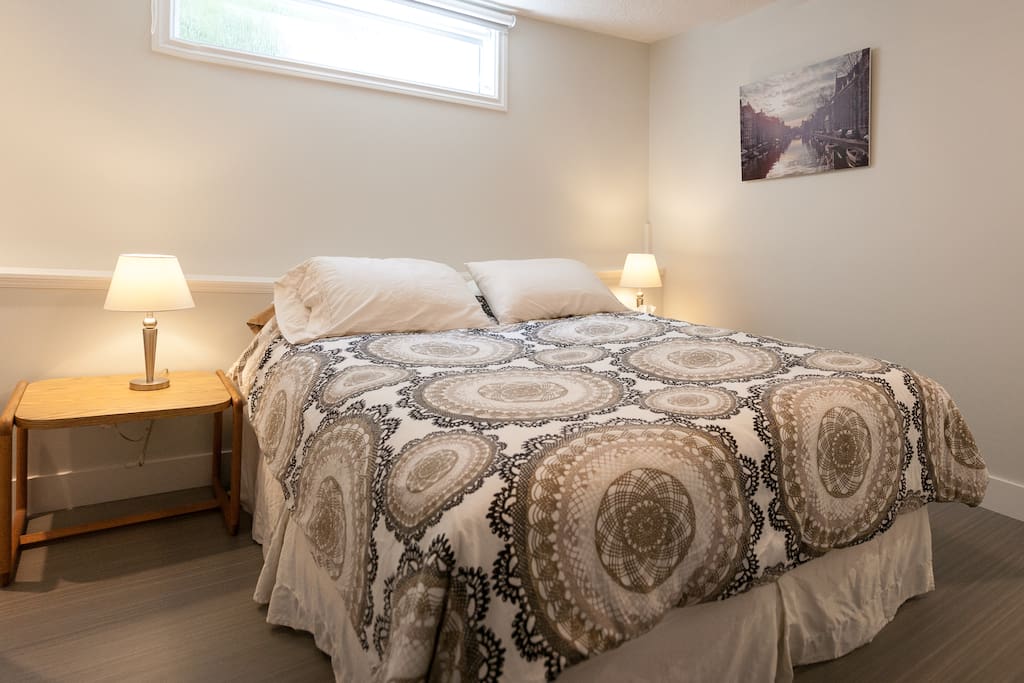 There is a comfortable queen sized bed and a large closet with plenty of space to keep your luggage organized.